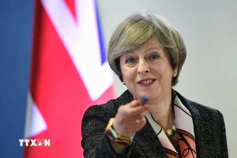 Thủ tướng Anh Theresa May trong cuộc họp báo ở Brussels, Bỉ. (Nguồn: AFP/TTXVN)