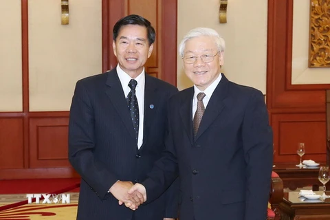 Tổng Bí thư Nguyễn Phú Trọng tiếp Đô trưởng Thủ đô Vientiane Sinlavong Khoutphaythoune. (Ảnh: Lâm Khánh/TTXVN)