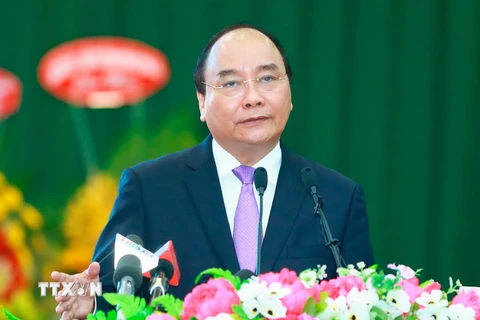 Thủ tướng Nguyễn Xuân Phúc dự Hội nghị xúc tiến đầu tư-thương mại-du lịch vào tỉnh Trà Vinh năm 2017. (Ảnh: Thống Nhất/TTXVN)