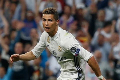Ronaldo sau khi lập cú hat-trick. (Nguồn: Reuters)