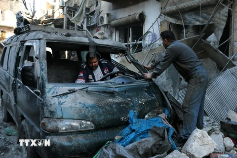 Cảnh đổ nát sau các cuộc giao tranh giữa quân đội chính phủ và phiến quân tại thành phố Aleppo, miền Nam Syria. (Nguồn: AFP/TTXVN)