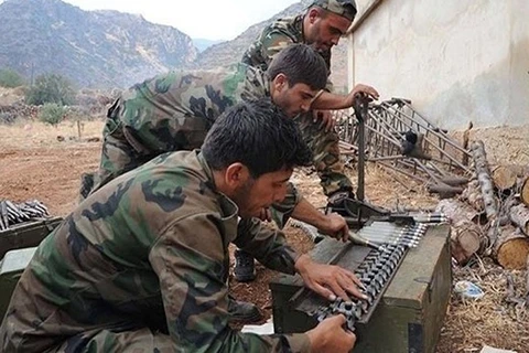 Các tay súng Hezbollah tại một cứ điểm quân sự ở khu vực biên giới Liban-Syria. (Nguồn: alalam.ir)