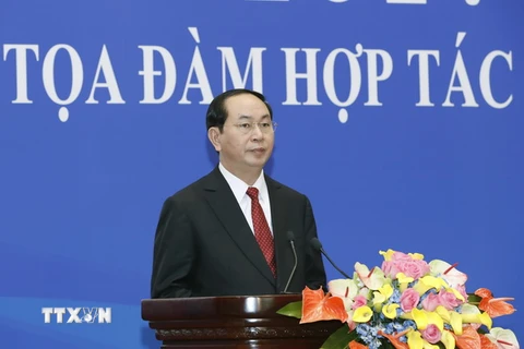 Chủ tịch nước Trần Đại Quang phát biểu tại buổi tọa đàm. (Ảnh: Nhan Sáng/TTXVN)