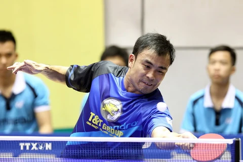 Tay vợt Trần Tuấn Quỳnh (Hà Nội T&T) thi đấu vòng loại nội dung đồng đội nam. (Ảnh: Quốc Khánh/TTXVN)
