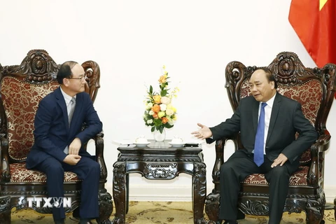 Thủ tướng Nguyễn Xuân Phúc tiếp ông Han Myoung-sup, Tổng giám đốc Tổ hợp Samsung Việt Nam. (Ảnh: Thống Nhất/TTXVN)