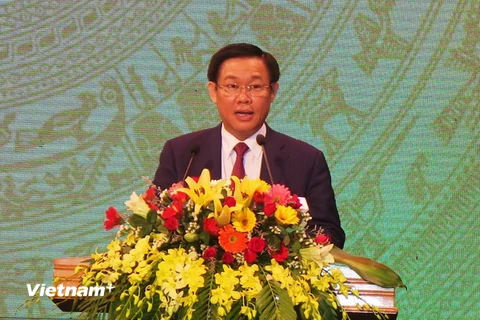 Phó Thủ tướng Vương Đình Huệ phát biểu tại Lễ kỷ niệm. (Ảnh Phan Quân/Vietnam+)