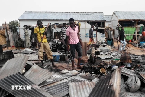 Hiện trường một vụ đánh bom do Boko Haram tiến hành ở Maiduguri, Đông Bắc Nigeria. (Nguồn: AFP/TTXVN)