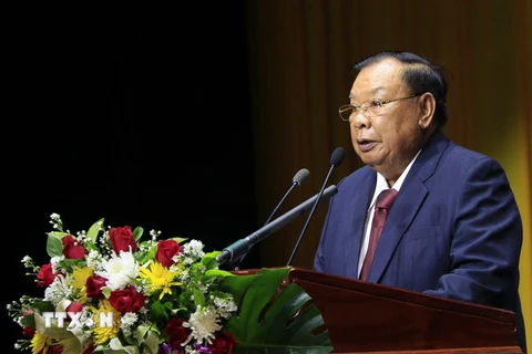 Tổng Bí thư, Chủ tịch nước Bounnhang Volachith phát biểu tại buổi lễ. (Ảnh: Phạm Kiên/TTXVN) 
