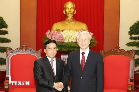 Tổng Bí thư Nguyễn Phú Trọng tiếp Phó Chủ tịch nước Lào Phankham Viphavan. (Ảnh : Trí Dũng/TTXVN)