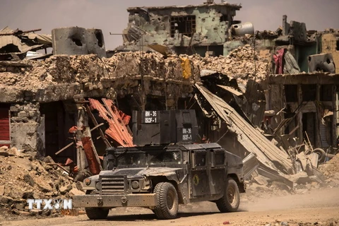 Các lực lượng Iraq tuần tra trên đường phố Mosul. (Nguồn: AFP/TTXVN)