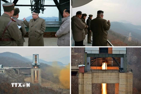 Nhà lãnh đạo Triều Tiên Kim Jong-un theo dõi vụ thử động cơ tên lửa ở bãi phóng vệ tinh Sohae. (Nguồn: Yonhap/TTXVN)