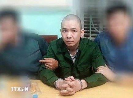 Nguyễn Văn Tình bị bắt giữ. (Nguồn: TTXVN)
