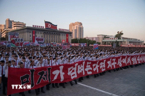 Người dân Triều Tiên tham gia lễ míttinh ở Bình Nhưỡng ngày 23/9. (Nguồn: AFP/TTXVN)