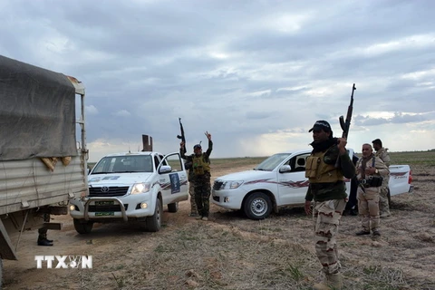 Binh sỹ quân đội Iraq sau khi giành lại một khu vực từ tay IS ở phía bắc tỉnh Diyala. (Nguồn: AFP/TTXVN)