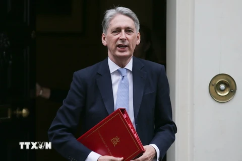 Bộ trưởng Tài chính Anh Philip Hammond sau một cuộc họp ở London. (Nguồn: AFP/TTXVN)