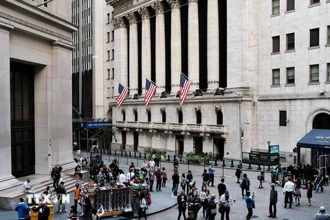 Người dân Mỹ tại trung tâm tài chính Manhattan, New York. (Nguồn: AFP/TTXVN)