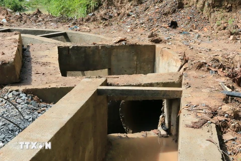 Cống thoát nước không có nắp đậy nơi cháu Nguyễn Tấn Trường bị nước cuốn mất tích tại Đồng Nai. (Ảnh: Sỹ Tuyên/TTXVN)