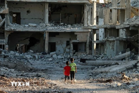 Cảnh đổ nát do chiến sự tại Daraa, Syria. (Nguồn: AFP/TTXVN)