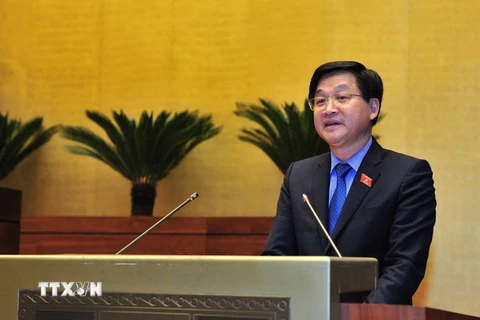 Tổng Thanh tra Chính phủ Lê Minh Khái trình bày Báo cáo công tác giải quyết khiếu nại, tố cáo của công dân năm 2017. (Ảnh: Phương Hoa/TTXVN)