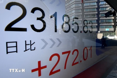 Bảng tỷ giá chứng khoán tại thủ đô Tokyo, Nhật Bản. (Nguồn: AFP/TTXVN)