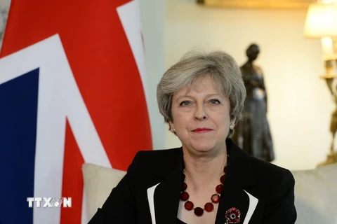 Thủ tướng Anh Theresa May phát biểu tại một hội nghị ở London. (Nguồn: AFP/TTXVN)