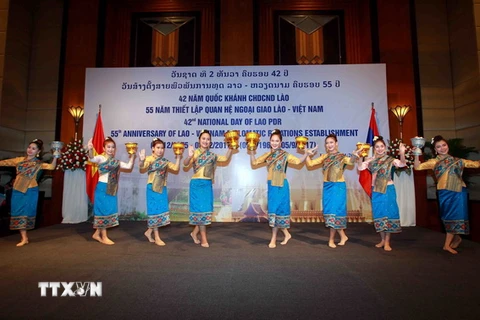 Lễ kỷ niệm 42 năm ngày Quốc khánh Lào. (Ảnh: An Đăng/TTXVN)