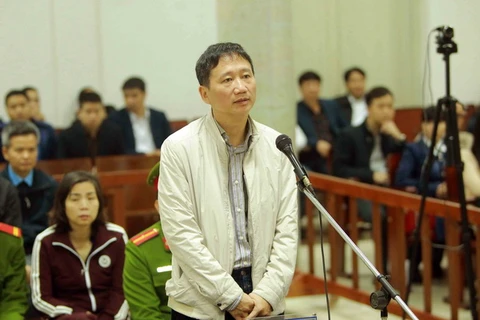 Bị cáo Trịnh Xuân Thanh trả lời Hội đồng xét xử về kiểm tra căn cước. (Ảnh: An Đăng/TTXVN)
