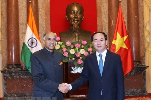 Chủ tịch nước Trần Đại Quang tiếp Đại sứ Cộng hòa Ấn Độ Parvathaneni Harish đến trình Quốc thư nhân nhiệm kỳ công tác tại Việt Nam ngày 9/6/2016. (Ảnh: Nhan Sáng/TTXVN)