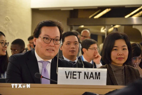 Đoàn Việt Nam tham dự khóa họp lần thứ 37 Hội đồng Nhân quyền Liên hợp quốc. (Ảnh: Hoàng Hoa/TTXVN)