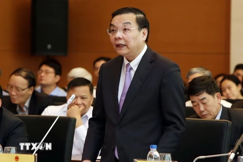 Bộ trưởng Bộ Khoa học và Công nghệ Chu Ngọc Anh trả lời chất vấn. (Ảnh: Nguyễn Dân/TTXVN)