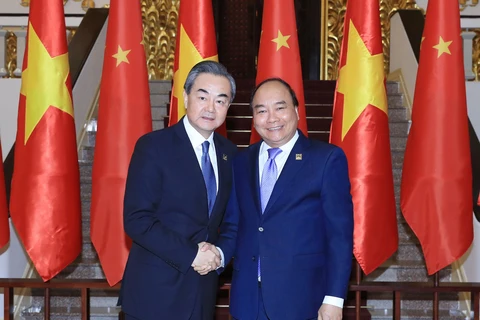 Thủ tướng Nguyễn Xuân Phúc tiếp Bộ trưởng Ngoại giao Trung Quốc Vương Nghị. (Ảnh: Thống Nhất/TTXVN)