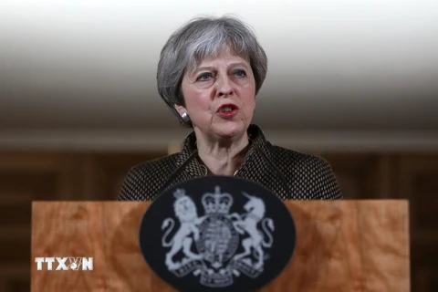 Thủ tướng Anh Theresa May phát biểu trong cuộc họp báo tại London. (Nguồn: AFP/TTXVN)