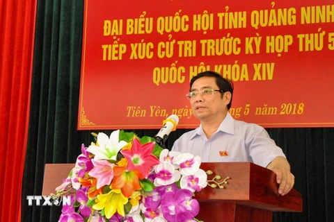 Trưởng Ban Tổ chức Trung ương Phạm Minh Chính phát biểu tại buổi tiếp xúc cử tri huyện Tiên Yên (Quảng Ninh). (Ảnh: Trung Nguyên/TTXVN)