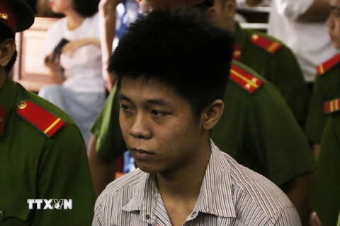 Bị cáo Nguyễn Hữu Tình tại phiên tòa. (Ảnh: Thành Chung/TXVN)