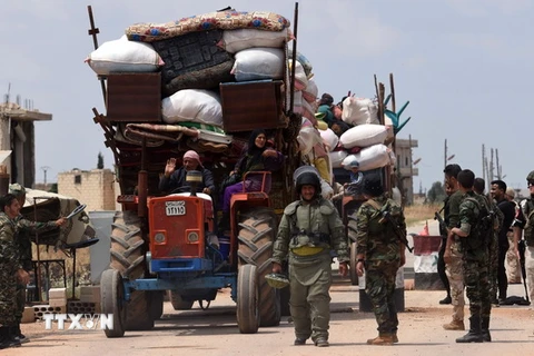 Cảnh sát vũ trang Nga được triển khai tại một trạm kiểm soát ở tỉnh Idlib, Syria. (Nguồn: AFP/TTXVN)
