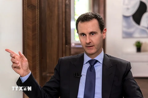 Tổng thống Syria Bashar al-Assad trả lời phỏng vấn truyền thông Nga tại Damascus. (Nguồn: AFP/TTXVN) 