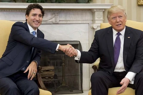 Thủ tướng Canada Justin Trudeau và Tổng thống Mỹ Donald Trump. (Nguồn: AFP)