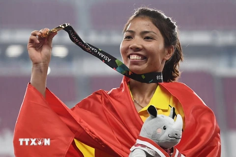 Vận động viên Bùi Thị Thu Thảo giành Huy chương Vàng nội dung nhảy xa nữ tại ASIAD 2018. (Nguồn: AFP/TTXVN)