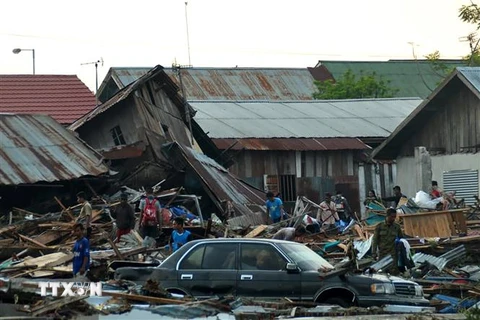 Cảnh đổ nát do động đất, sóng thần tàn phá ở Palu, đảo Sulawesi. (Nguồn: AFP/TTXVN)