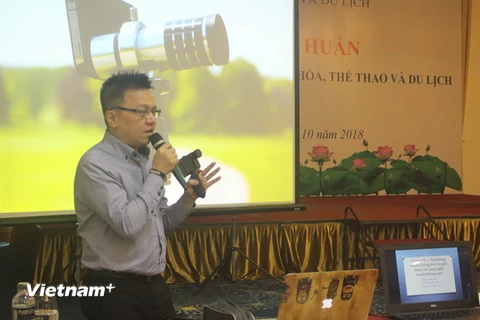Phó Tổng Giám đốc Thông tấn xã Việt Nam Lê Quốc Minh thuyết trình tại Hội nghị. (Ảnh: Hoa Mai/Vietnam+)