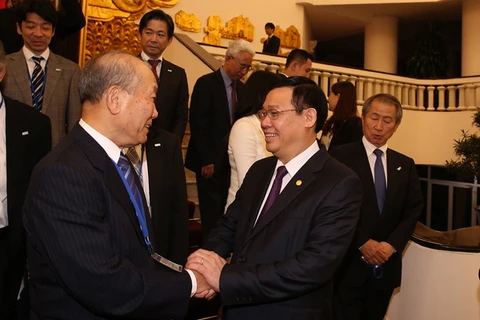 Phó Thủ tướng Vương Đình Huệ và Phó Chủ tịch FEC Yoshihiko Nakagaki. (Nguồn: baochinhphu.vn)