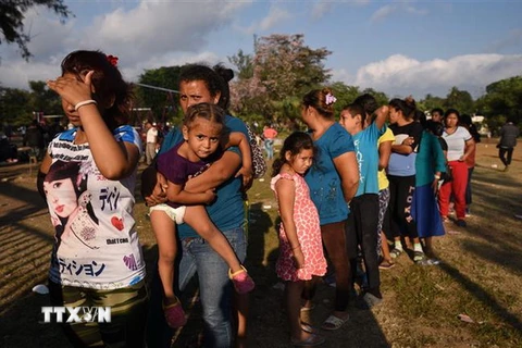 Người di cư di chuyển tới khu vực biên giới Mexico-Mỹ bang Oaxaca, Mexico. (Nguồn: AFP/TTXVN)
