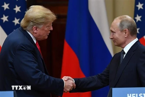 Tổng thống Mỹ Donald Trump (trái) trong cuộc họp báo chung với Tổng thống Nga Vladimir Putin sau cuộc gặp thượng đỉnh ở Helsinki, Phần Lan ngày 16/7. (Nguồn: AFP/TTXVN)