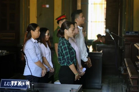 Các bị cáo nguyên là cán bộ, nhân viên Eximbank chi nhánh Thành phố Hồ Chí Minh tại phiên tòa. (Ảnh: Thành Chung/TTXVN)