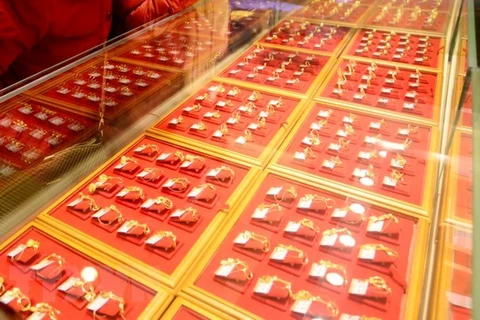 Cửa hàng vàng trang sức tại Tế Nam, thủ phủ tỉnh Sơn Đông, Trung Quốc. (Nguồn: THX/TTXVN) 