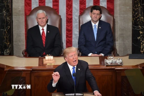 Tổng thống Mỹ Donald Trump (phía trước) đọc thông điệp liên bang tại Quốc hội ở Washington, DC ngày 30/1/2018. (Nguồn: AFP/TTXVN)
