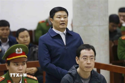 Bị cáo Đinh Văn Ngọc, nguyên Tổng giám đốc Công ty Cổ phần Lọc hóa dầu Bình Sơn, tại phiên xét xử. (Ảnh: Doãn Tấn/TTXVN)