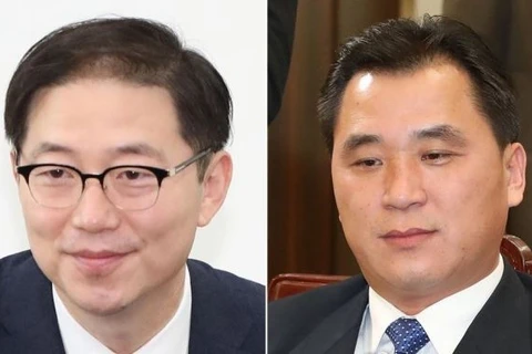 Thứ trưởng Bộ Thống nhất Hàn Quốc Chun Hae-sung (trái) và người đồng cấp Triều Tiên Hwang Chung-song. (Nguồn: Yonhap)