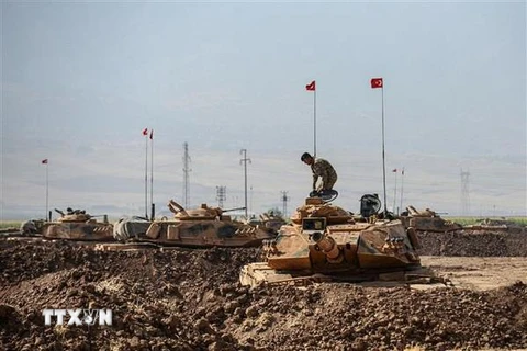 Binh sỹ Thổ Nhĩ Kỳ trong một cuộc diễn tập tại khu vực cửa khẩu Habur ở biên giới Thổ Nhĩ Kỳ-Iraq. (Nguồn: AFP/TTXVN)