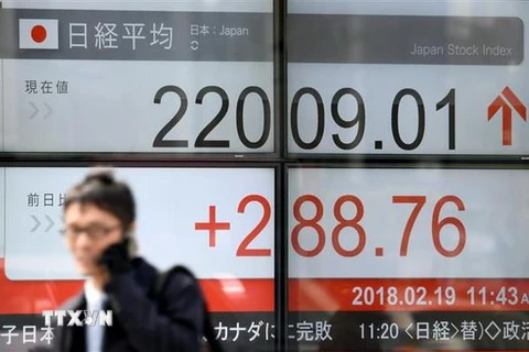Bảng tỷ giá chứng khoán tại Tokyo, Nhật Bản. (Nguồn: AFP/TTXVN)